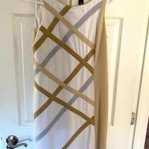 Sleeveless dress with geometric design from White House/Market.